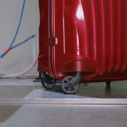 Test házením kufrem