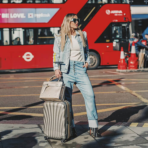 mysamsonite @camilacarril knows how to combine her #LFW look with our My Samsonite handbag and 10 Years Cosmolite spinner. #SamsonitexLondon my-samsonite-social